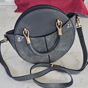 Chic Black Circle Crossbody Bag with Gold Accents